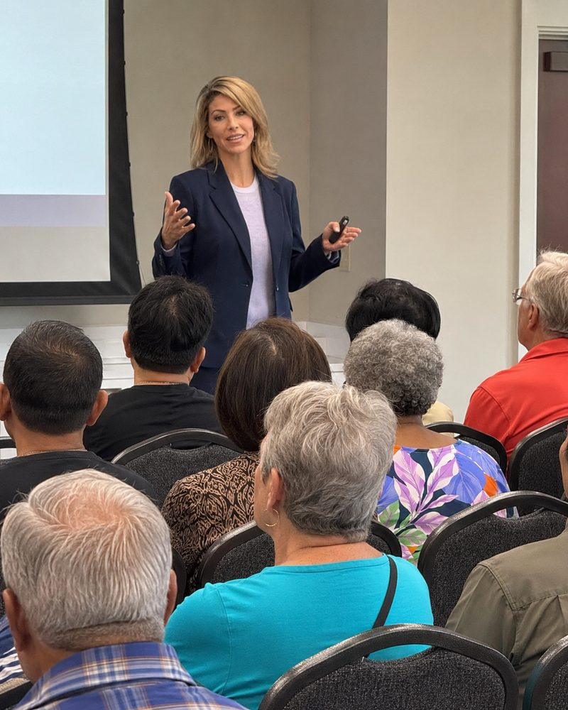 A presenter leading a timeshare seminar